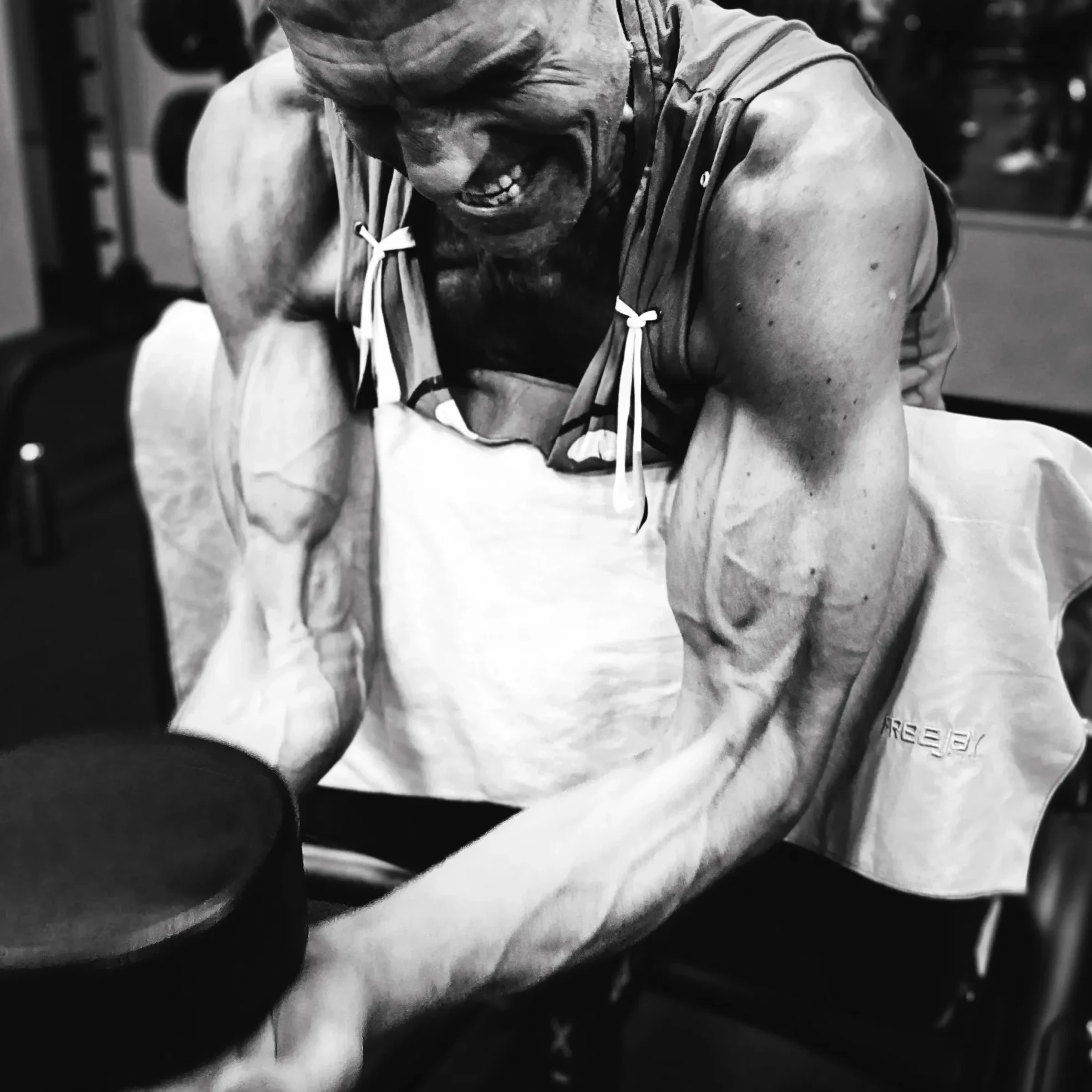 Athlete training with weights in the gym